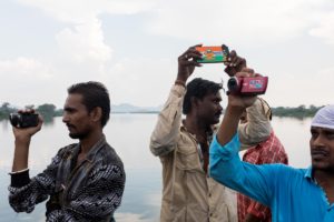 Local journalists cover a protest in Nisarpur, Dhar, Madhya Pradesh, by the Narmada Bachao Andolan, against shutting down a bridge across the Uri Baghri, a vital link to tribal settlements in the hills. September 10, 2017.