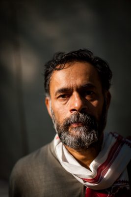 Yogendra Yadav is a prominent political activist, social scientist, and leader in India. Known for his active involvement in socio-political movements, Yadav has been a vocal advocate for issues such as farmers' rights, social justice, and electoral reforms.

As a co-founder of Swaraj Abhiyan and the political party Swaraj India, Yogendra Yadav has played a significant role in shaping the political discourse and raising awareness about grassroots democracy. His efforts have focused on empowering marginalized communities, promoting transparency in governance, and championing the rights of farmers.

With a background in academia and research, Yadav brings intellectual depth and critical analysis to his activism. He has been an influential voice in the field of political science, contributing to public discourse through his writings and public engagements.

Yogendra Yadav's commitment to social and political change has earned him recognition and respect both nationally and internationally. He continues to engage with communities, policymakers, and civil society organizations to address systemic challenges and work towards a more inclusive and equitable society.

Through his relentless advocacy and unwavering dedication, Yogendra Yadav remains an influential figure in the political landscape of India, inspiring individuals to actively participate in shaping the future of the nation.

Experience the intensity and determination of Yogendra Yadav, prominent political activist and leader, through a captivating closeup headshot. This powerful photograph, captured by renowned magazine photographer Harsha Vadlamani, immortalizes Yadav's resolute spirit during a protest at Jantar Mantar.

The closeup composition brings Yadav's striking features and unwavering gaze to the forefront, reflecting his passion and commitment to social and political causes. The image encapsulates the essence of his activism, capturing a moment of raw emotion and conviction.

Shot against the backdrop of a protest at Jantar Mantar, the photograph serves as a visual testament to Yadav's dedication to fighting for justice and bringing about societal change. It symbolizes the power of collective action and the role of individuals in shaping the political landscape.

Harsha Vadlamani's skilled photography perfectly captures the essence of Yogendra Yadav's activism, creating a compelling visual narrative. The closeup headshot serves as a reminder of the impact that dedicated individuals can make in challenging the status quo and advocating for a better future.

Immerse yourself in the world of political activism and social change through this captivating closeup headshot of Yogendra Yadav. Let Vadlamani's expertise transport you to the heart of the Jantar Mantar protest, where the determination and unwavering spirit of individuals like Yadav shape the course of society.