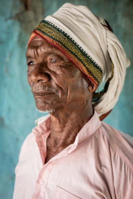 Portrait with dignity of Indiegenous communitiy leader, Dukku Chamaru Tofa, Gond Adivasi Elder from Mendha-Lekha in Gadchiroli, Maharashtra, India.
