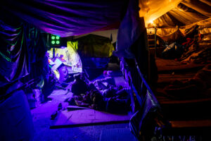 Farmers rest between two tractor trollies on the highway at Singhu. December 08, 2020.