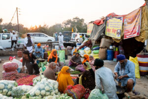 Volunteers chop vegetables in preparation for dinner at a langar at Singhu. December 09, 2020.