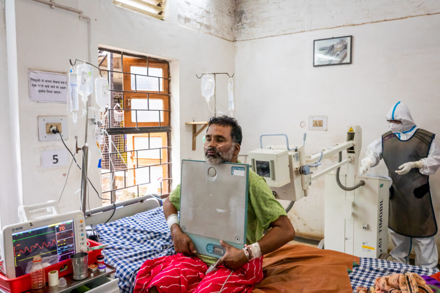 A technician does a chest X-Ray for Bhaskar Prasad Yadav, 47, in the COVID-19 ward at the JSS hospital in Ganiyari in Bilaspur, Chhattisgarh. May 15, 2021.