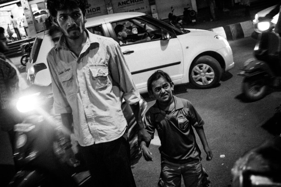 Kumar and Mallesh, both aspiring actors and. roommates, go shopping for food in the Krishna Nagar neighbourhood of Hyderabad. May 2012.