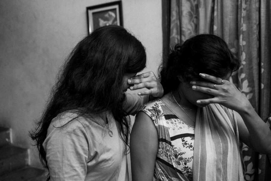 Anitha Mukkurala (23) and Kavya Reddy Gurram (24), apply glycerin in their eyes ahead of an emotional scene. The two became friends working together in a film and now look out for each other and exchange information about opportunities. August 2015.