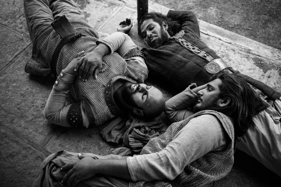 Junior artistes rest during a break in between shots on the sets of Baahubali, a period drama in Ramoji Film City, Hyderabad. October 2014.