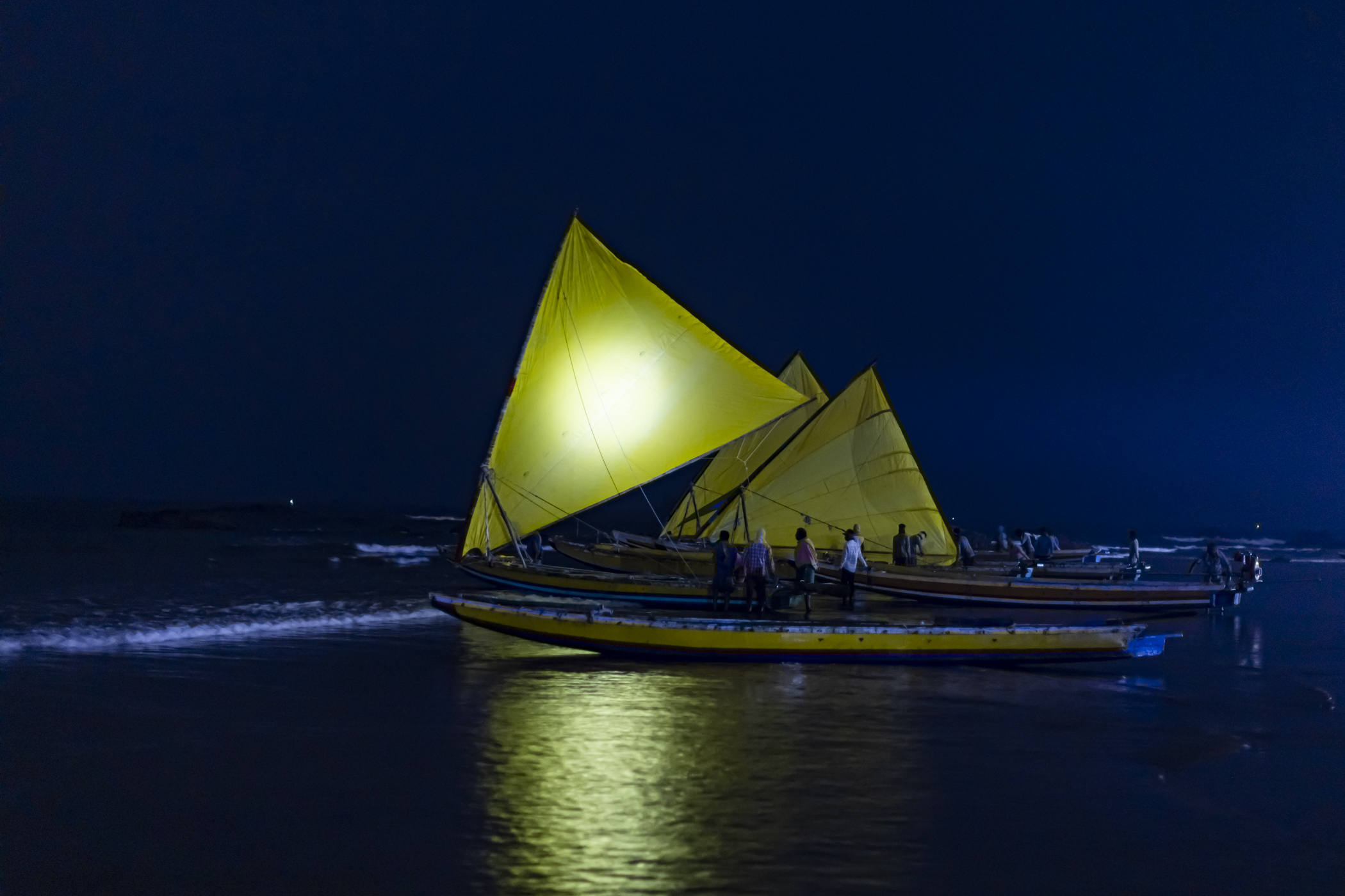 16 November 2022, Pudimadaka, Andhra Pradesh, India- Fishermen prepare to head out into the Bay of Bengal on their small motor-powered sailboats.  This photo mission has been supported by Central Institute of Fisheries Technology (ICAR- CIFT), India.