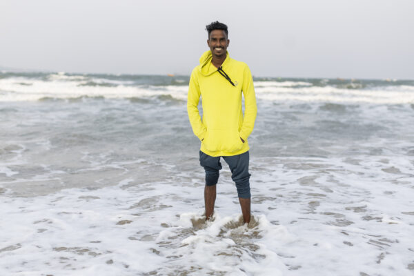 18 November 2022, Mangamaripeta, Andhra Pradesh, India- Ellaiah Bade, 25, a fisherman from the local community, poses for a portrait on the beach.  This photo mission has been supported by Central Institute of Fisheries Technology (ICAR- CIFT), India.