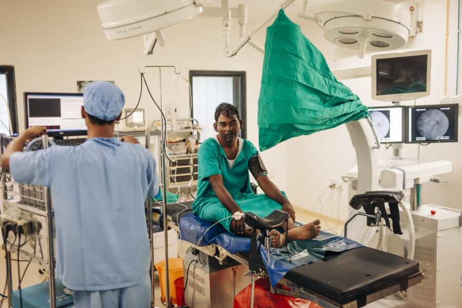 Baliram Jadhav, 40, waits on the operating table for anaesthesia to be administered before a surgery to remove the stones in his kidney at a private hospital in Latur city, Maharashtra. Jadhav, a farmer, says water from a bore well, which he’s been consuming for two years after the well dried up, is responsible for the stones. He delayed the surgery for two years as he didn’t have the money, but went in for the surgery as the pain grew worse with money borrowed from relatives and friends. May 03, 2016.