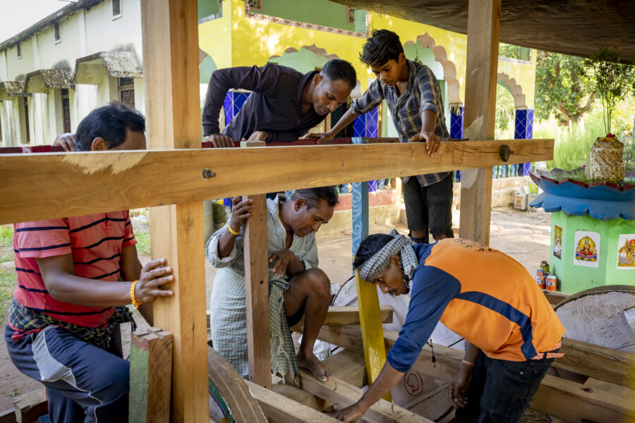 Workers build a chariot ahead of the annual Chariot festival (Rath Yatra) of Lord Jagannath, a major cultural and religious event in Odisha, at the Jagannath Temple in Titising in Odisha, India.