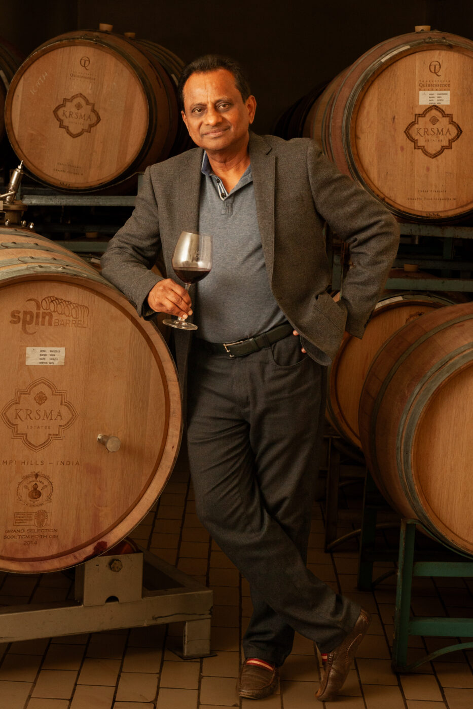 Stylishly lit environmental portrait of Krishna Prasad Chigurupati, entrepreneur and CEO of KRSMA Estates and Granules India pharmaceuticals, photographed with a brand storytelling approach.”